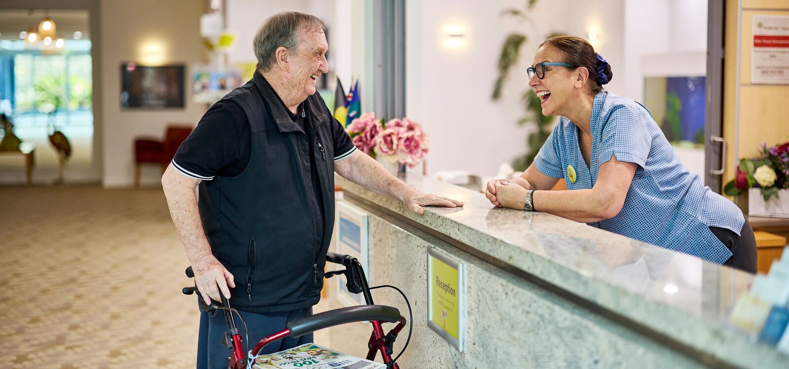 Resident delivering newspapers to other residents